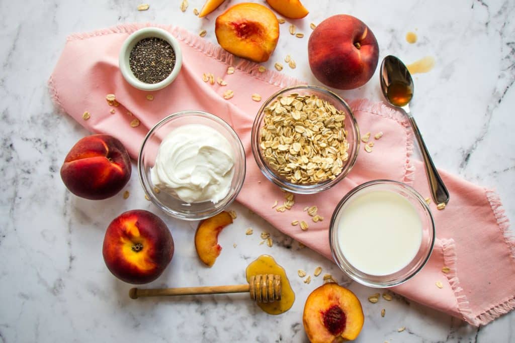 Ingredients needed to make peach overnight oats.
