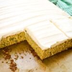 sliced zucchini sheet cake, sliced into squares