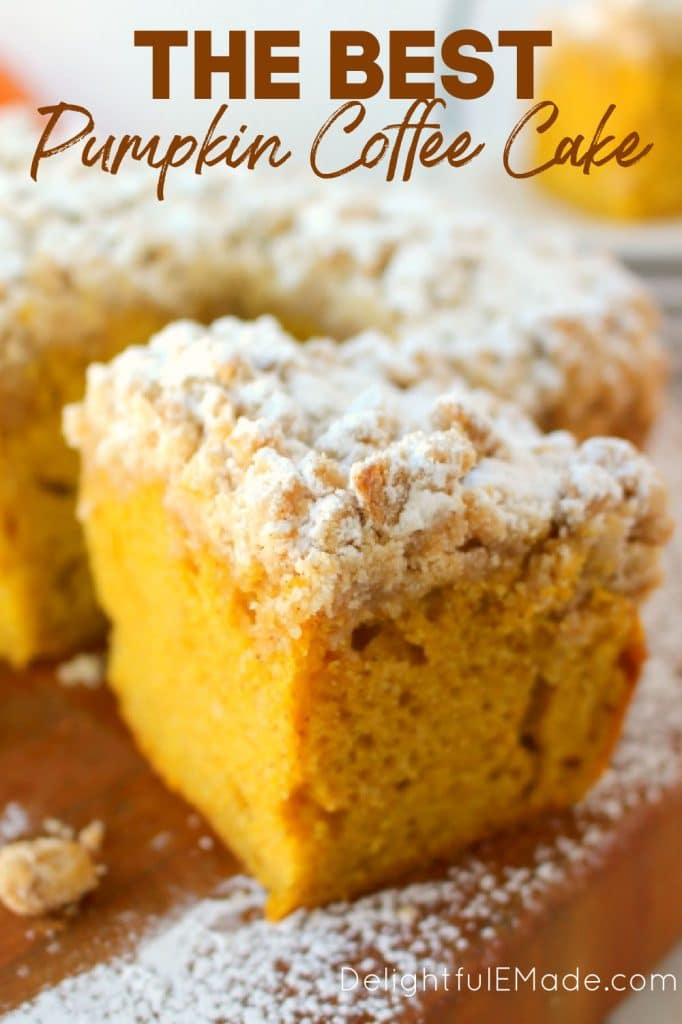 Slice of pumpkin crumb cake, taken out of cake. Topped with powdered sugar.