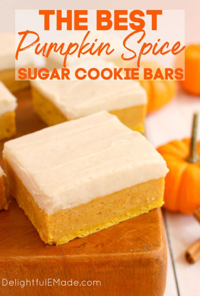 Pumpkin sugar cookie bars topped with cream cheese frosting, cut into squares and accented with pumpkins.