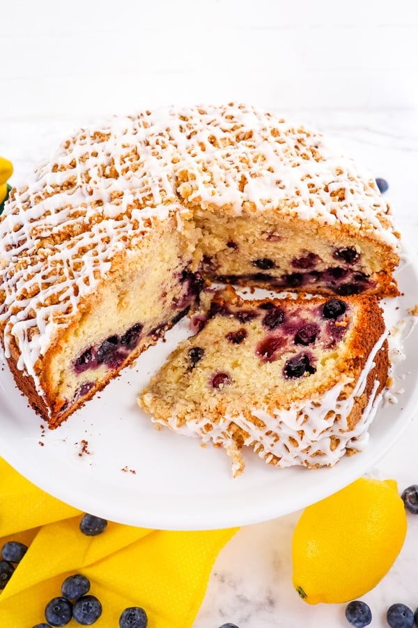 Lemon blueberry coffee cake, with slice on its side.