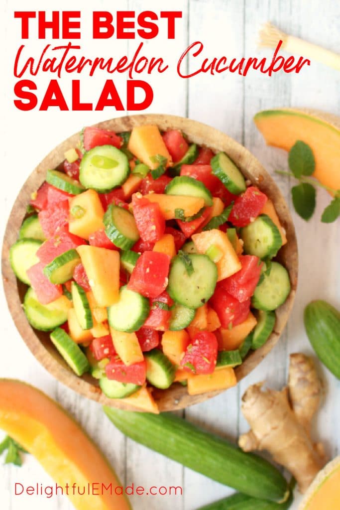 Watermelon cucumber salad in bowl with cucumbers and mint on the side.