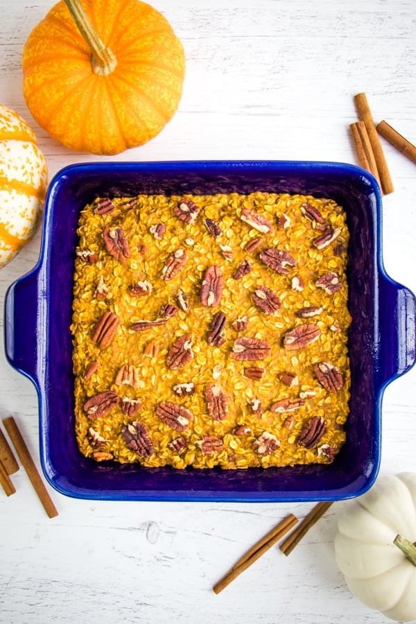 Healthy pumpkin baked oatmeal topped with pecans.