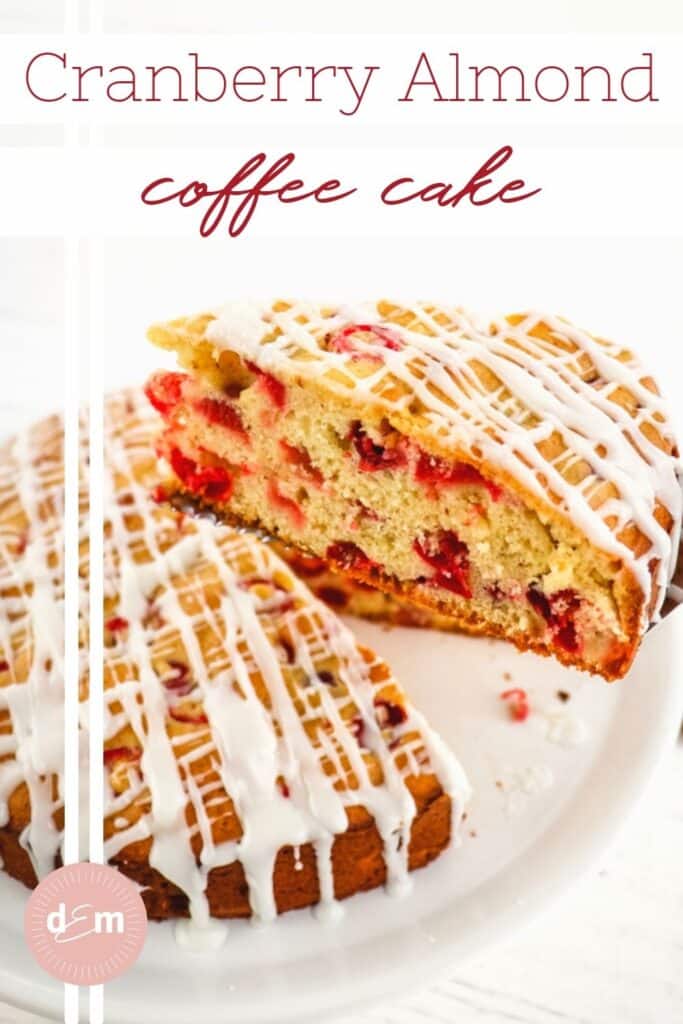 Slice of glazed cranberry coffee cake lifted from main cake.