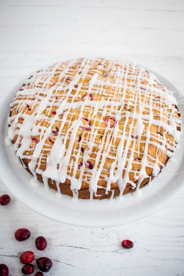 Cranberry coffee cake topped with icing.