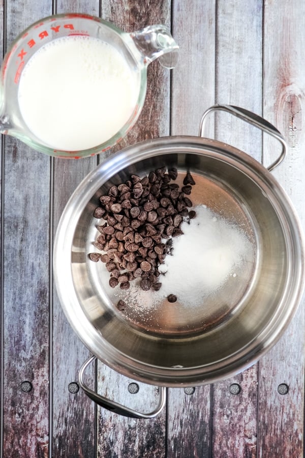 Chocolate chips, sugar, salt and milk in saucepan.