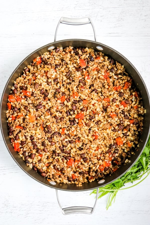 Mexican ground beef mixture in skillet.