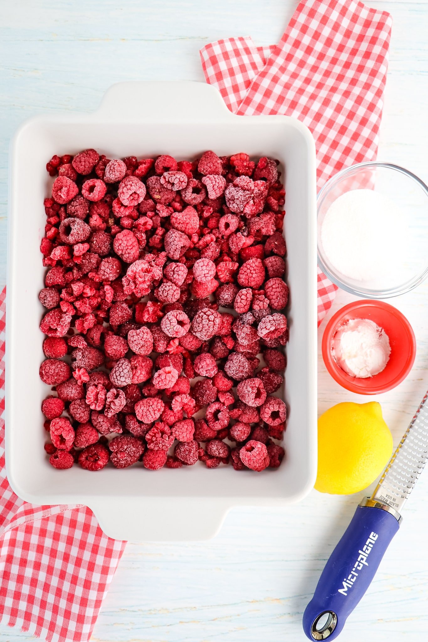 Frozen raspberries with lemon, sugar and corn starch on the side.