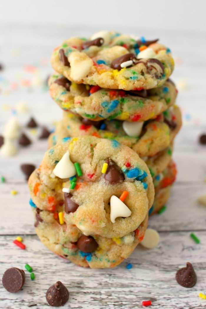 Stack of chocolate chip cake mix cookies with one cookie in the front.