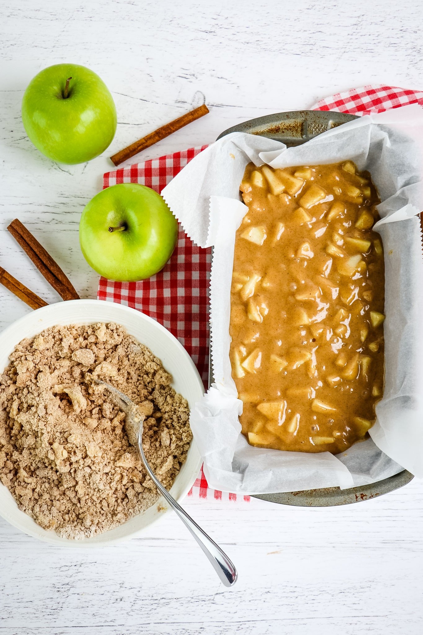 Apple cinnamon bread batter, with crumble topping on the side.