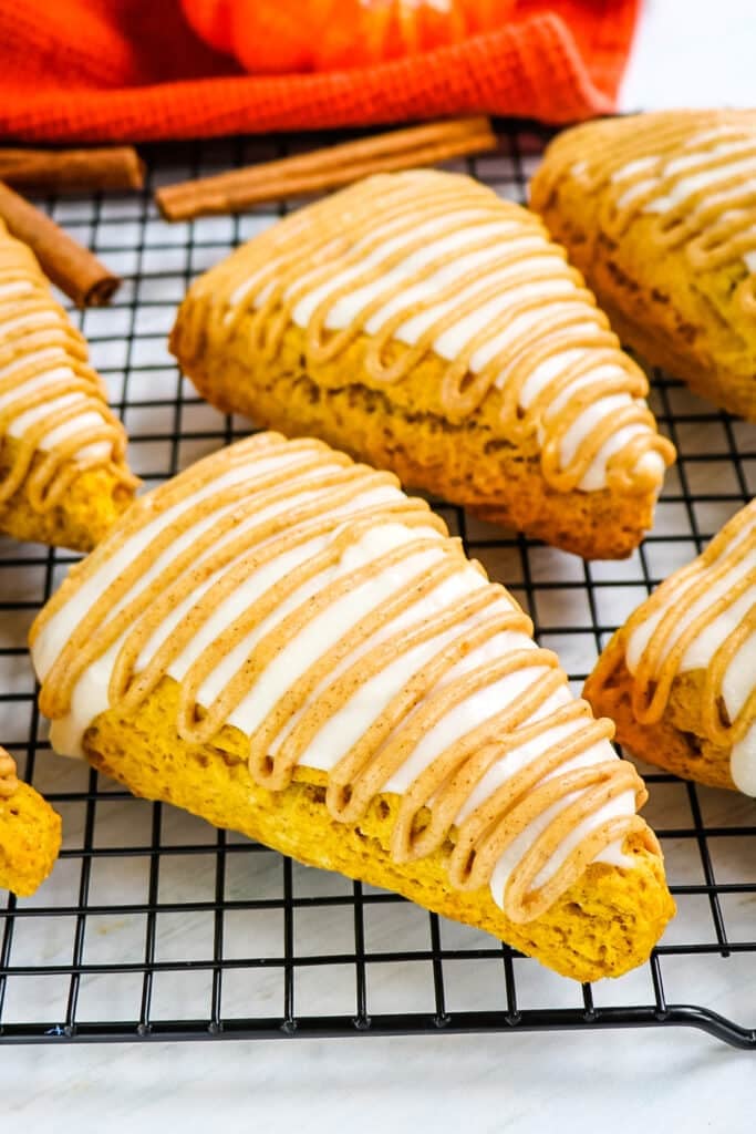 Starbucks pumpkin scones on baking rack.