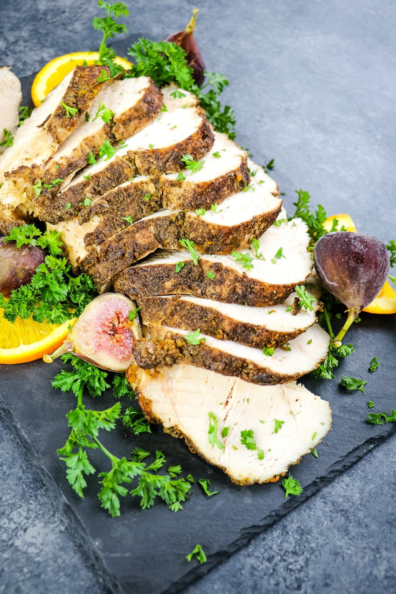 Slow cooker turkey breast recipe sliced and on platter.