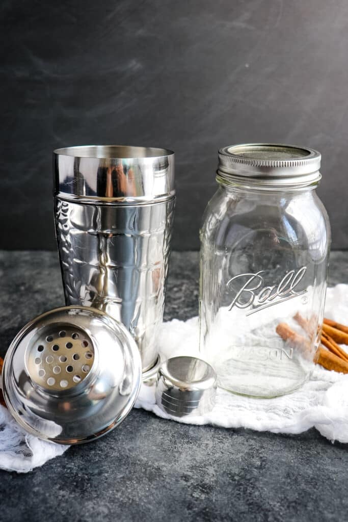 Cocktail shaker and mason jar used to make a tiramisu martini.