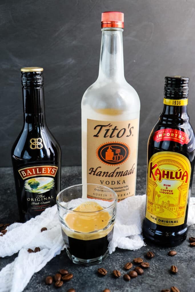 Ingredients needed to make a creamy espresso martini; Tito's, Bailey's, Kahlua and espresso.