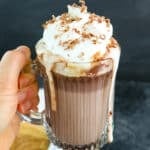 Baileys hot chocolate topped with whipped cream and chocolate shavings.