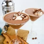 Chocolate cake martini topped with whipped cream and chocolate shavings.