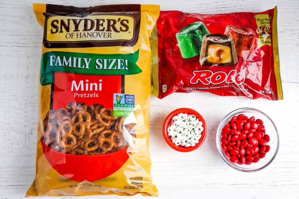 Ingredients needed to to make rolo reindeer pretzels.