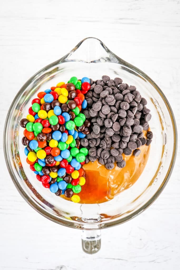 Ingredients for no bake peanut butter oatmeal balls in bowl before they are mixed together.