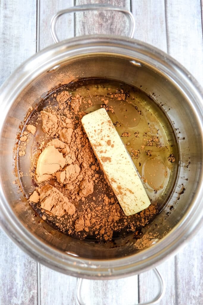 Ingredients in saucepan to make the buttermilk chocolate cake batter.