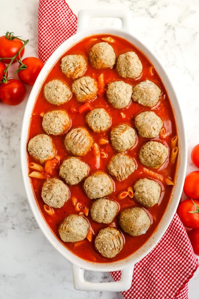 Meatballs added to top of dump and bake meatball casserole.