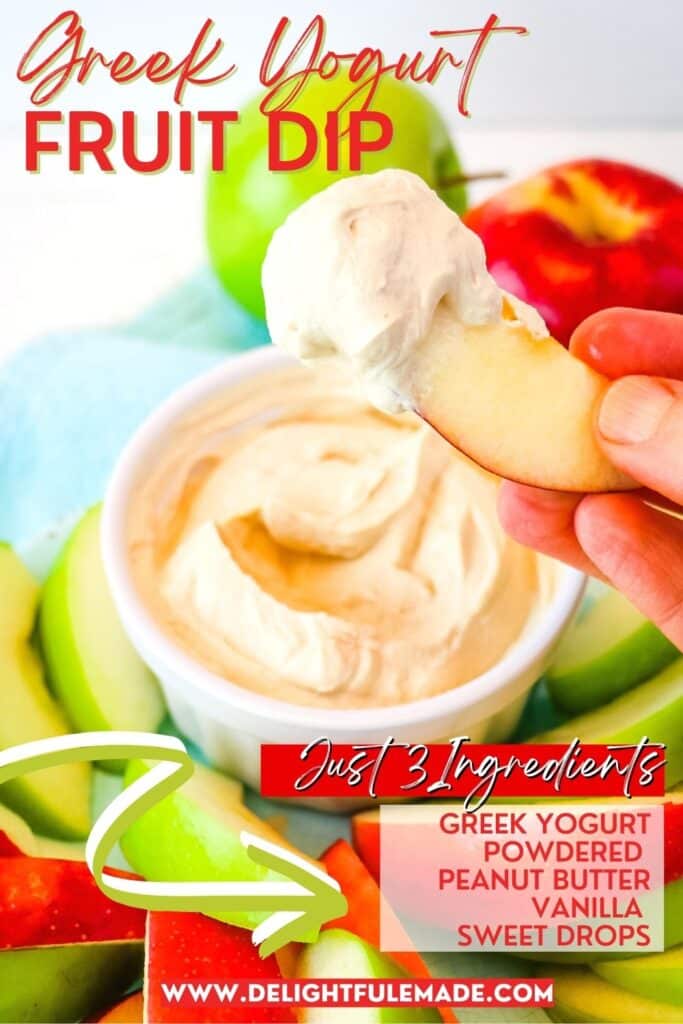 Peanut butter Greek yogurt fruit dip with apples in a bowl, being dipped with an apple slice.