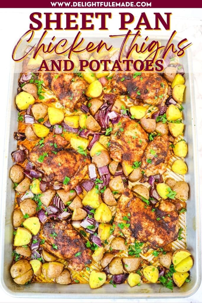 Sheet pan chicken thighs and potatoes topped with chopped parsley and red onions.