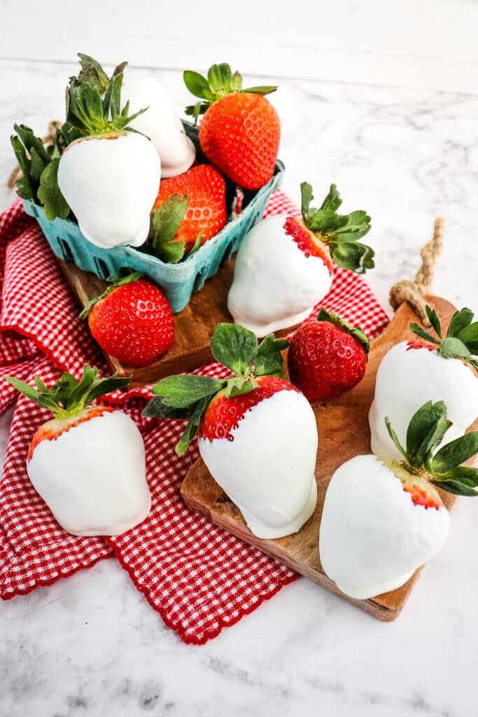 Basket of strawberries and white chocolate strawberries.