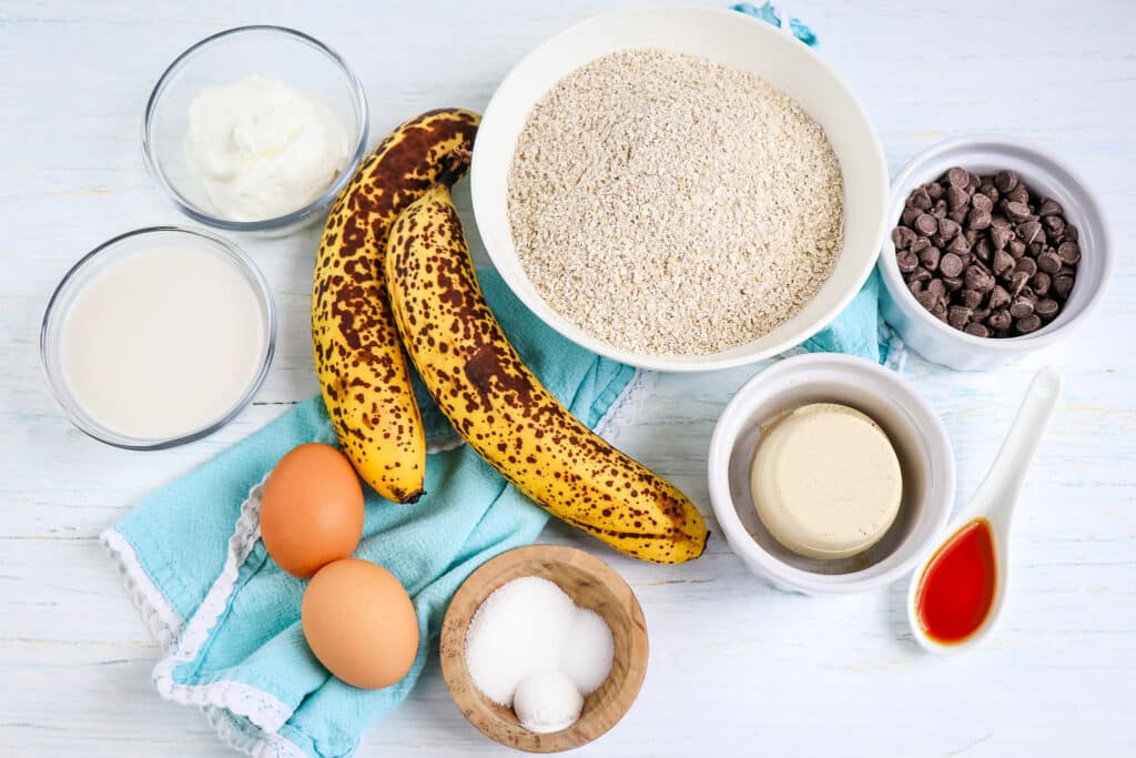 Ingredients needed to make banana chocolate chip protein muffins.