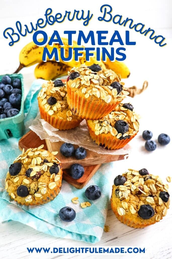 Banana blueberry oatmeal muffins stacked on boards and garnished with oats and fresh blueberries on the side.