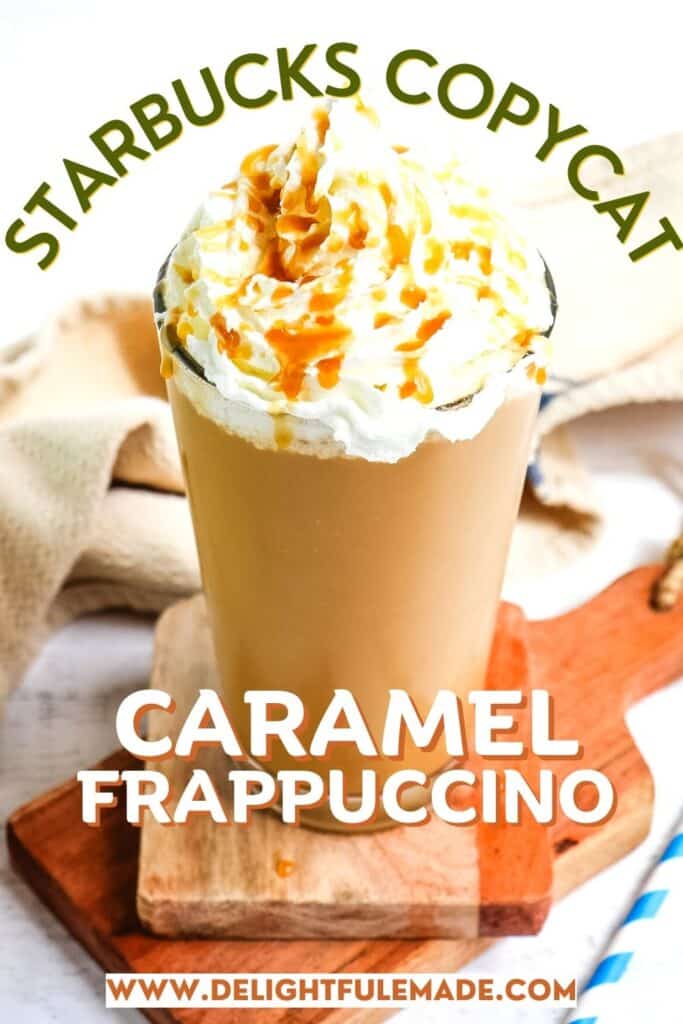 Caramel frappuccino recipe topped with whipped cream and caramel sauce with striped straw on the side.
