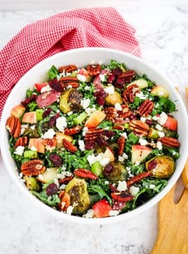Roasted Brussels sprouts salad with kale, quinoa, apples, cranberries and feta cheese.