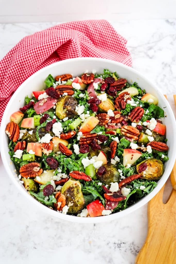 Roasted Brussels sprouts salad with kale, quinoa, apples, cranberries and feta cheese.