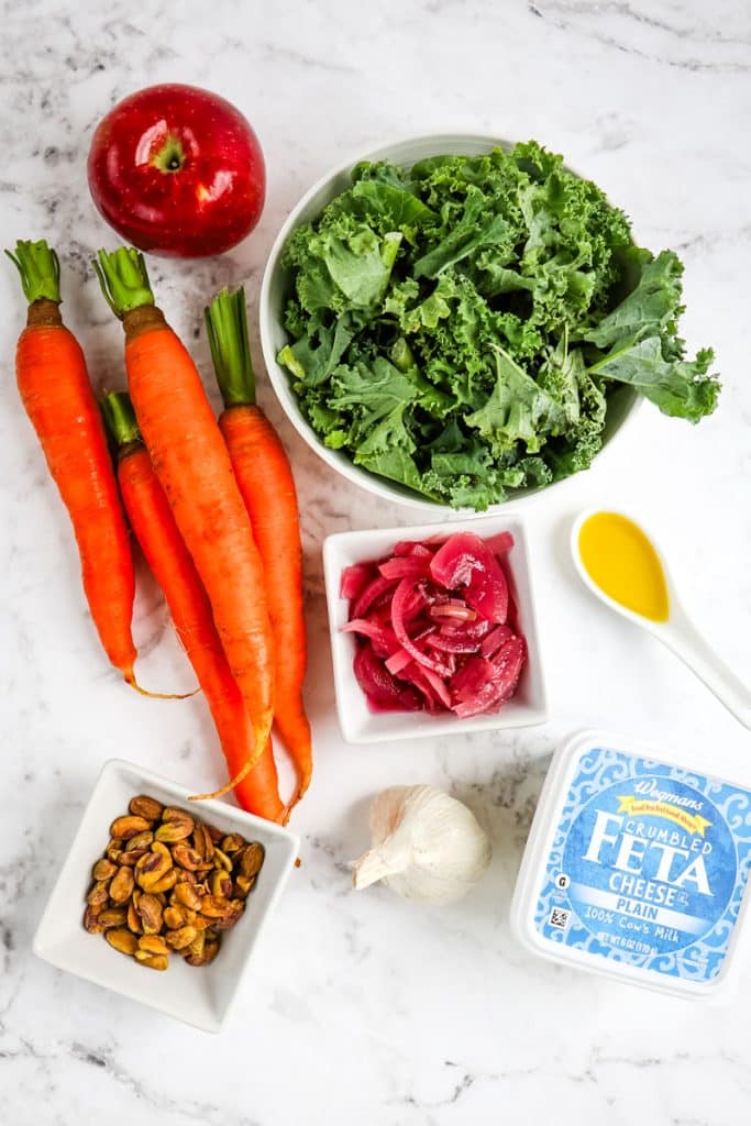 Ingredients needed to make a roasted carrot salad.